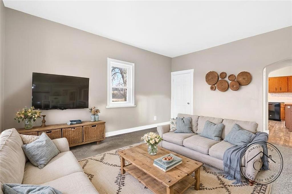 1107 Reeves Avenue Monessen, PA 15062 - Photo 10 of 33 a living room with furniture and a flat screen tv