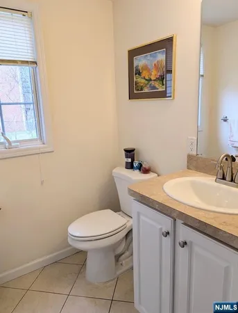 a bedroom with a bed and furniture