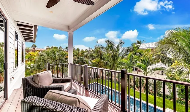 a bedroom with a bed and a lamp