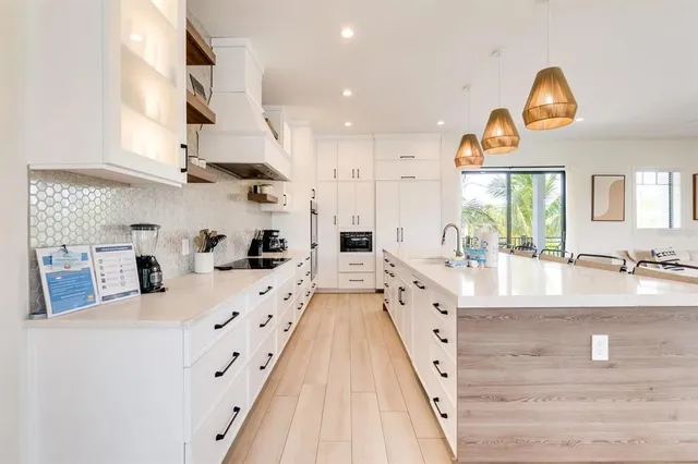 a bathroom with a toilet a sink and a mirror