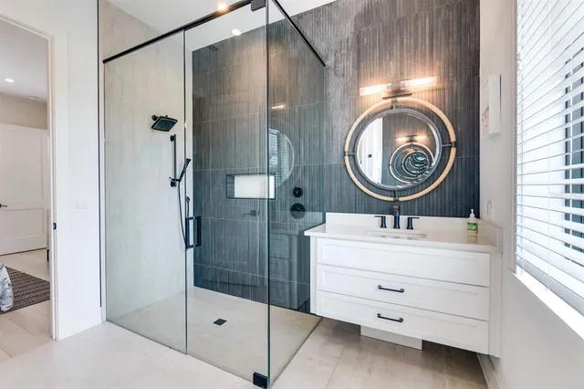 a view of a room with wooden floor and bathroom