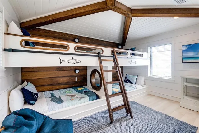 a bathroom with a toilet a sink and a mirror