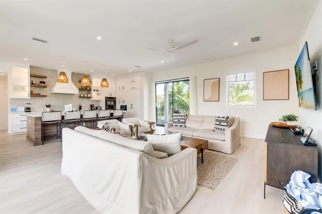 a view of entryway with wooden floor and stairs
