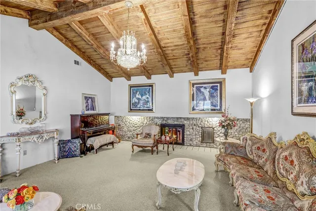 a spacious bedroom with a large bed and a large window