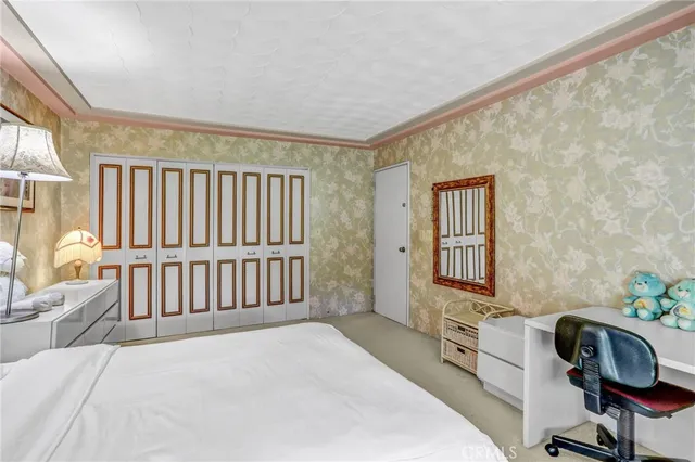 a view of storage and utility room with washer and dryer