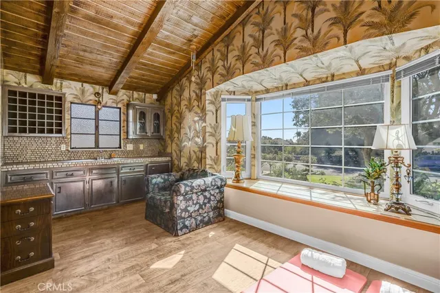 a view of a house with swimming pool and a yard