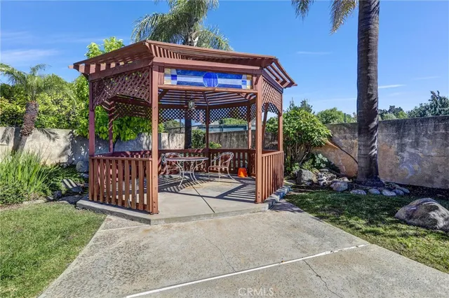 a view of a room with stairs and a large window