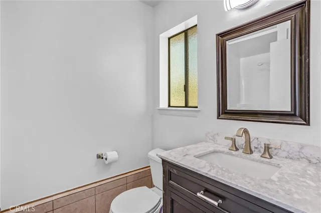 an aerial view of residential house and outdoor space