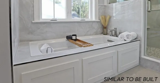 a close view of a sink and a vanity in the bathroom
