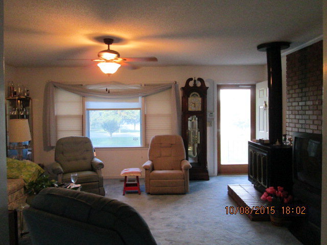 3585 Hamlin Road Lizella, GA 31052 - Photo 5 of 12 a living room with furniture and a window
