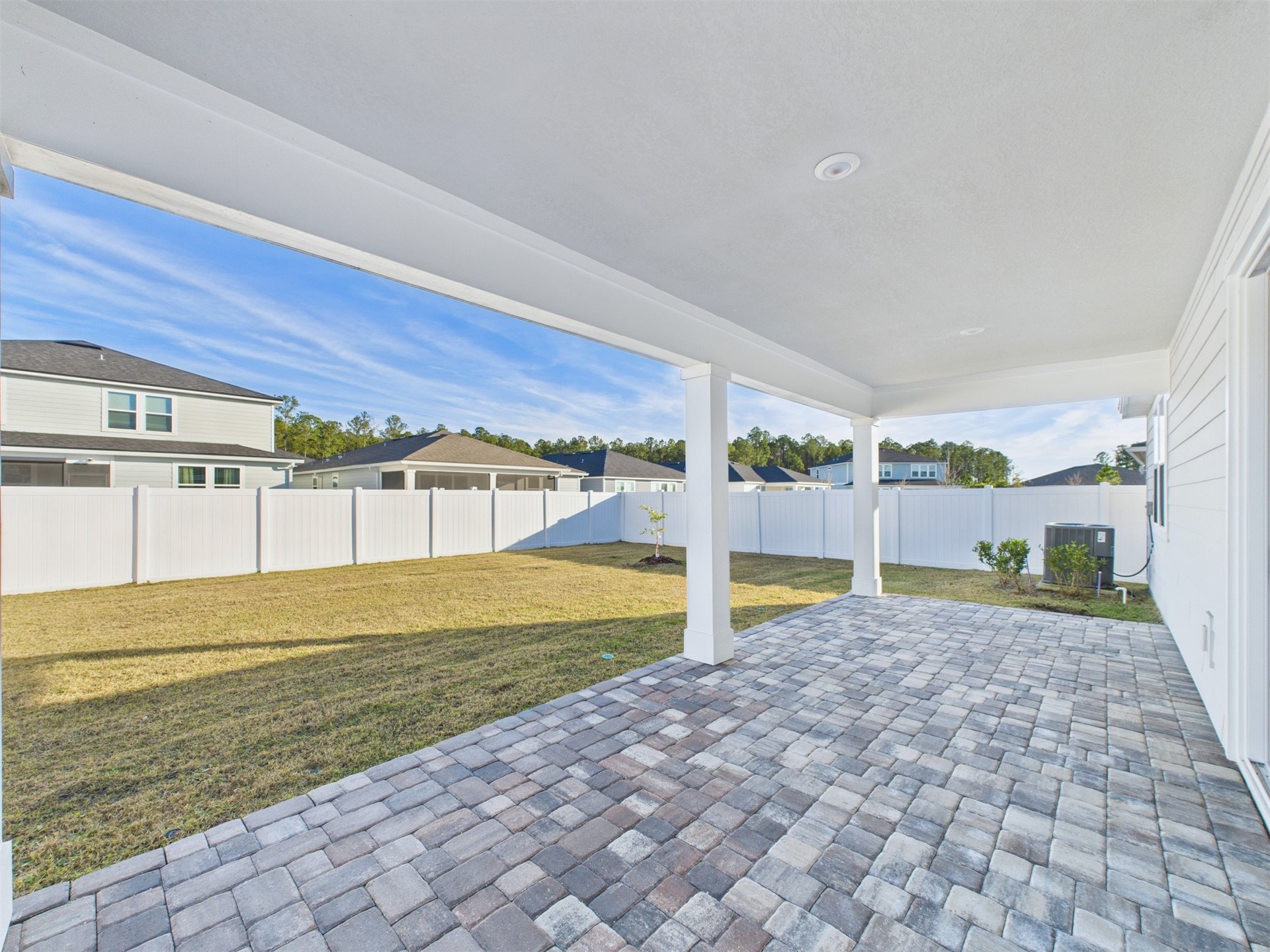 312 Salt Meadow Loop Yulee, FL 32097 - Photo 17 of 22 a view of a house with a backyard