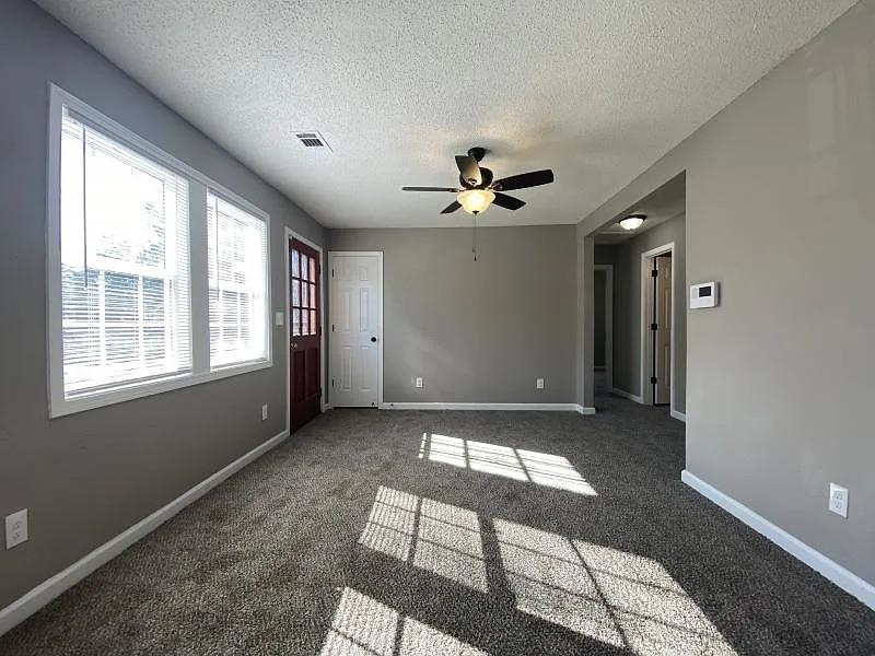 3509 West Horn Lake Road Memphis, TN 38109 - Photo 3 of 8 a view of an empty room with a window