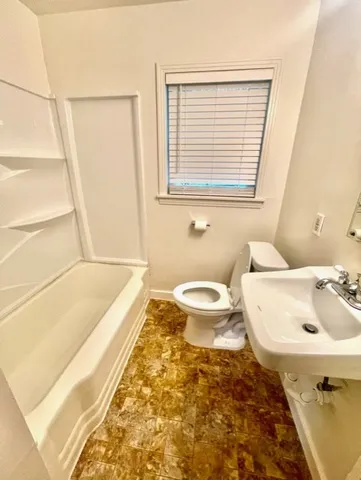 a bathroom with a sink and a bathtub