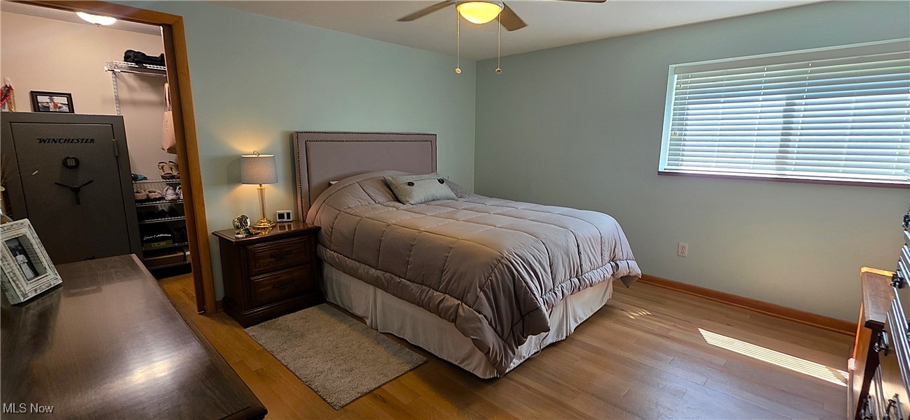 15485 Albion Road Strongsville, OH 44136 - Photo 26 of 36 1st floor Master Bedroom with two walk in closets, and ceiling fan