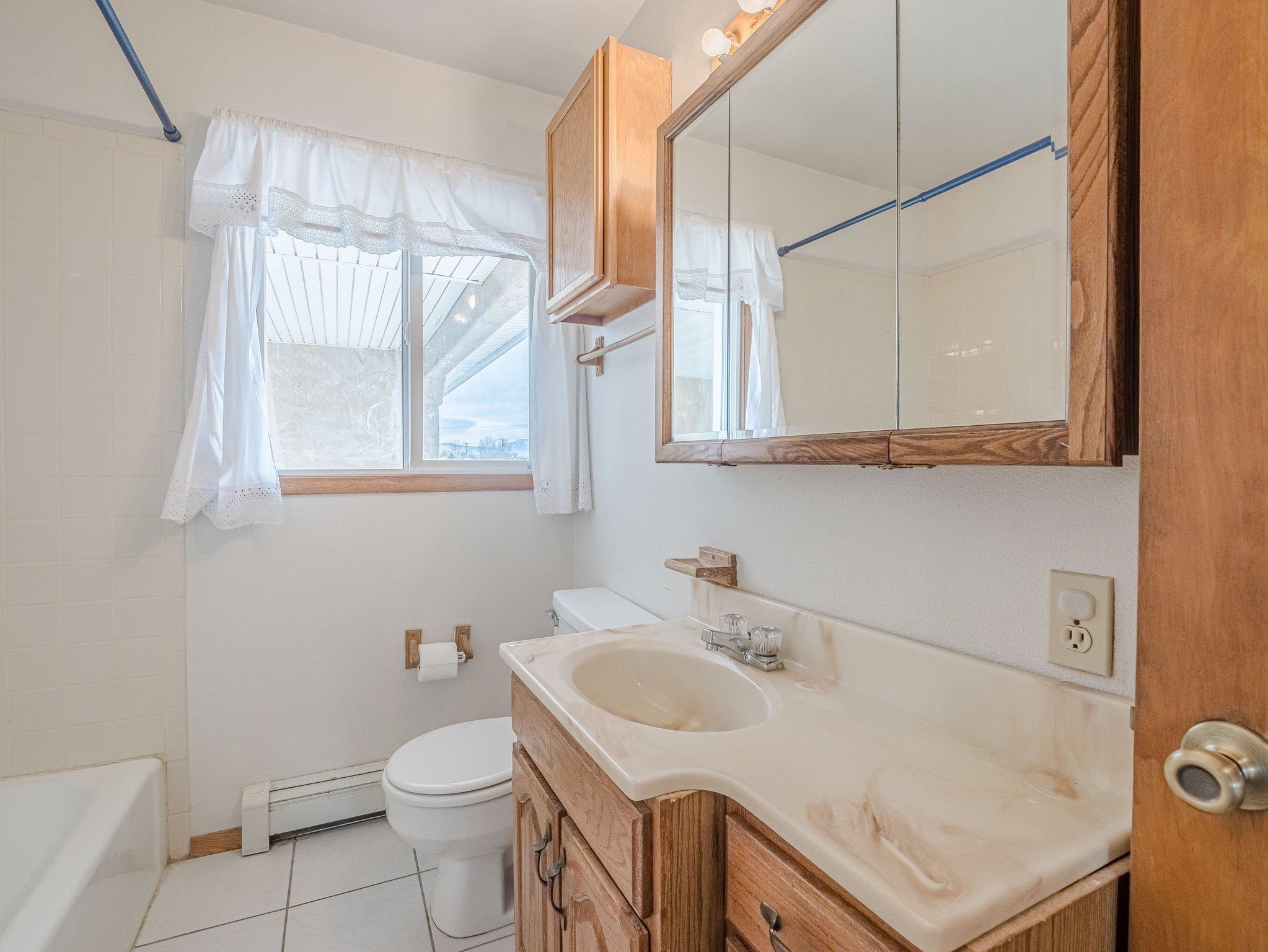 1895 L Road Fruita, CO 81521 - Photo 13 of 29 a bathroom with a sink and a toilet