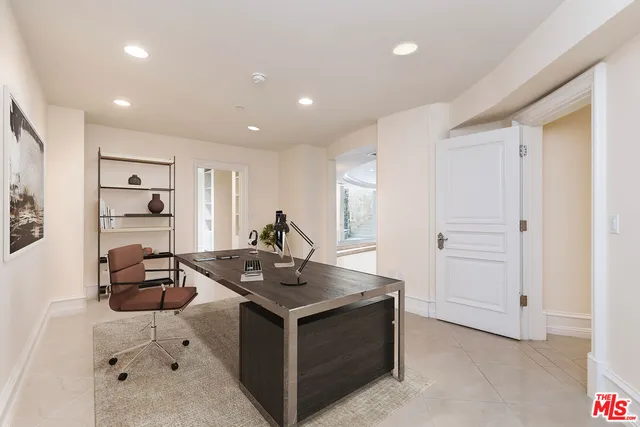 a room with gym equipment and appliances