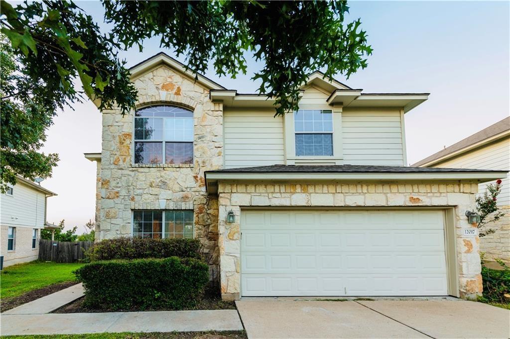 12017 Springs Head Loop Austin, TX 78717 - Photo 2 of 25 A stone and siding facade creates appealing curb appeal for this inviting two-story residence.