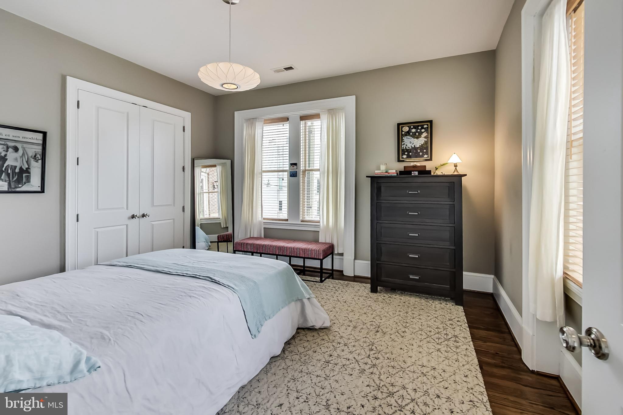 3324 18th Street Northwest, Unit 9 Washington, DC 20010 - Photo 24 of 44 a bedroom with a bed and a window