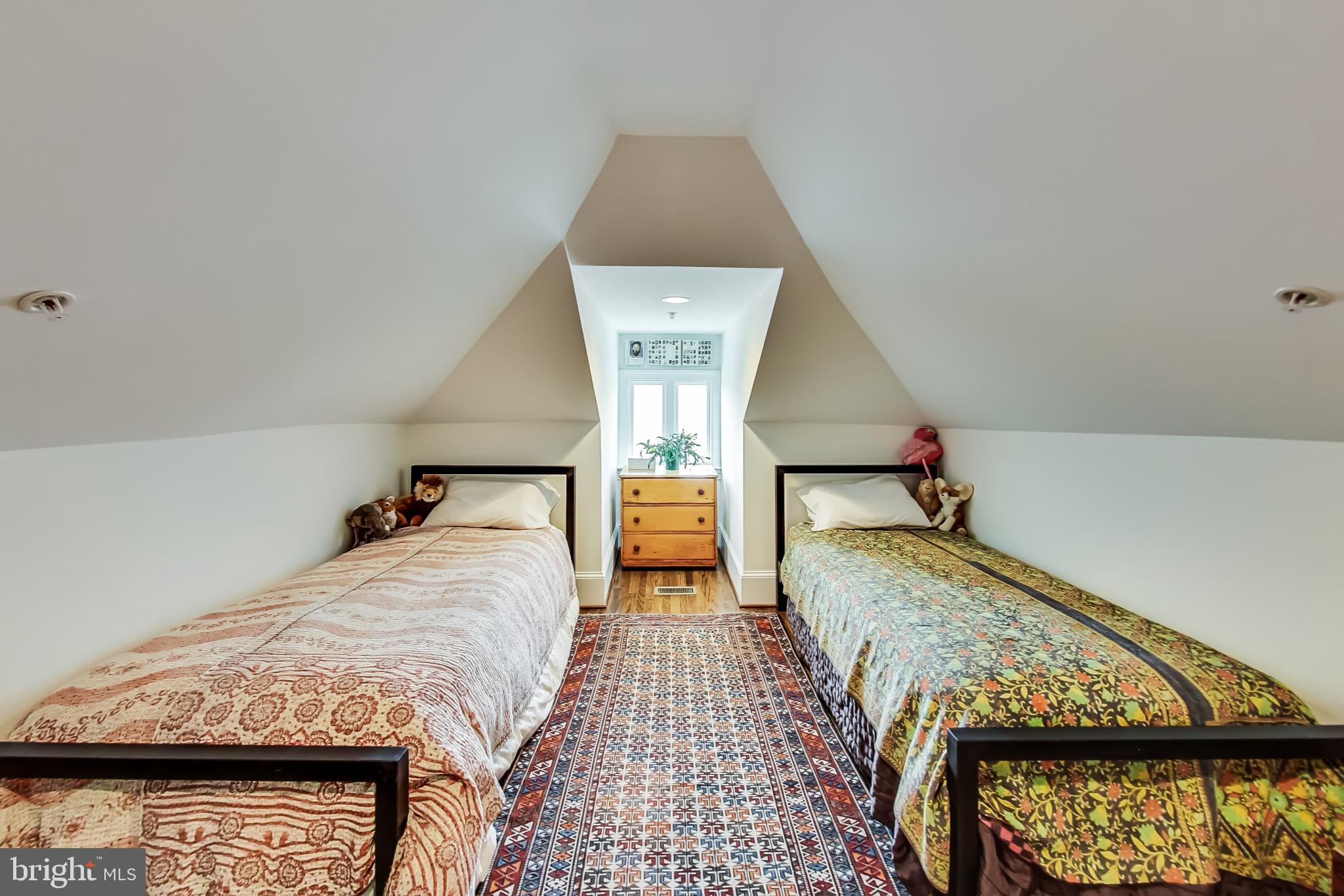 3324 18th Street Northwest, Unit 9 Washington, DC 20010 - Photo 30 of 44 a bedroom with bed and window