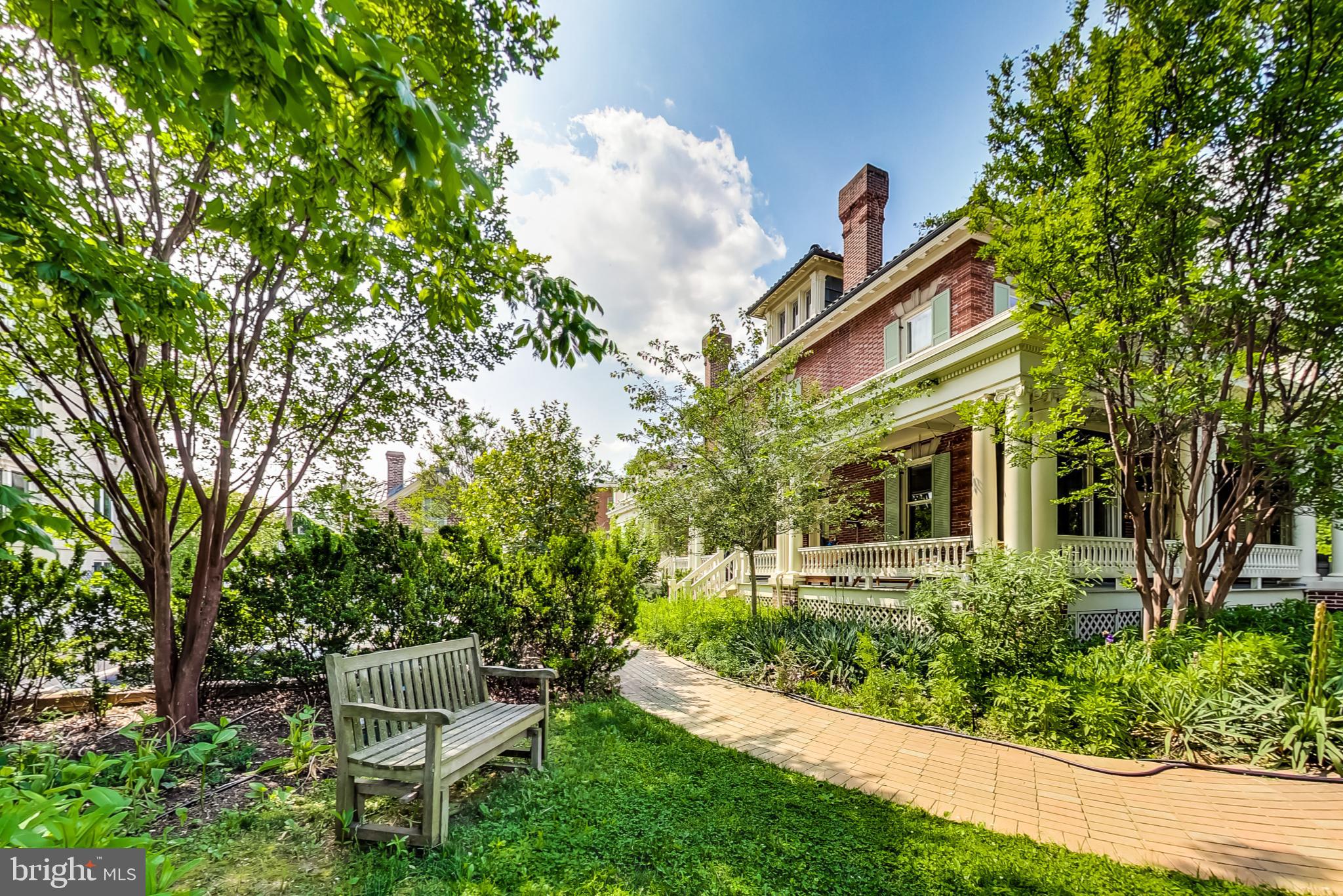 3324 18th Street Northwest, Unit 9 Washington, DC 20010 - Photo 33 of 44 a view of a chair and table in backyard of the house