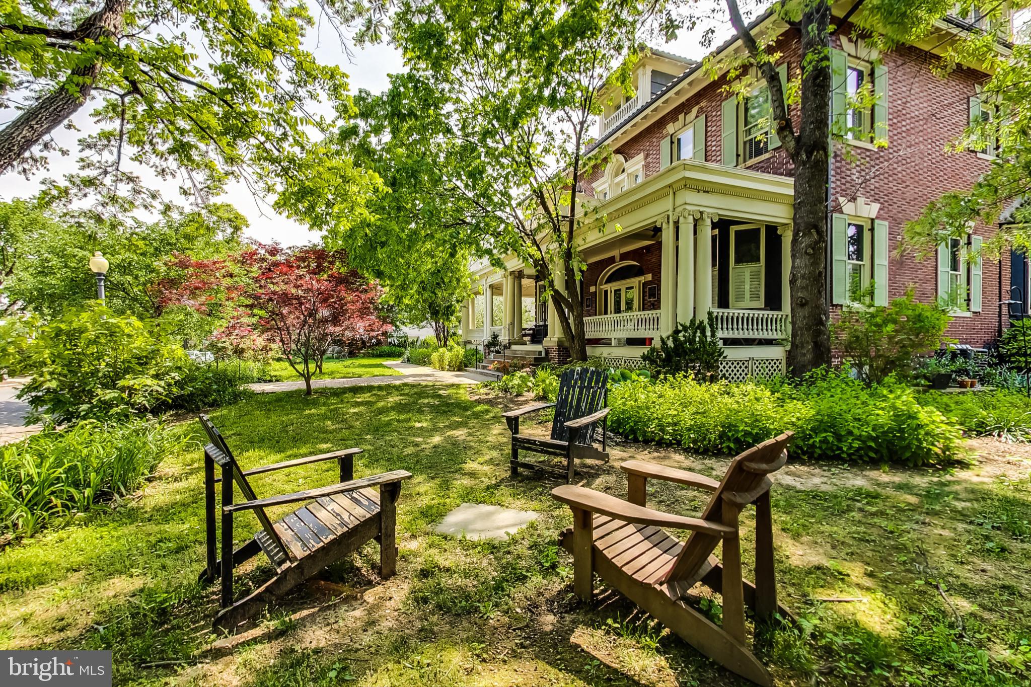 3324 18th Street Northwest, Unit 9 Washington, DC 20010 - Photo 34 of 44 a view of a backyard with sitting area and garden