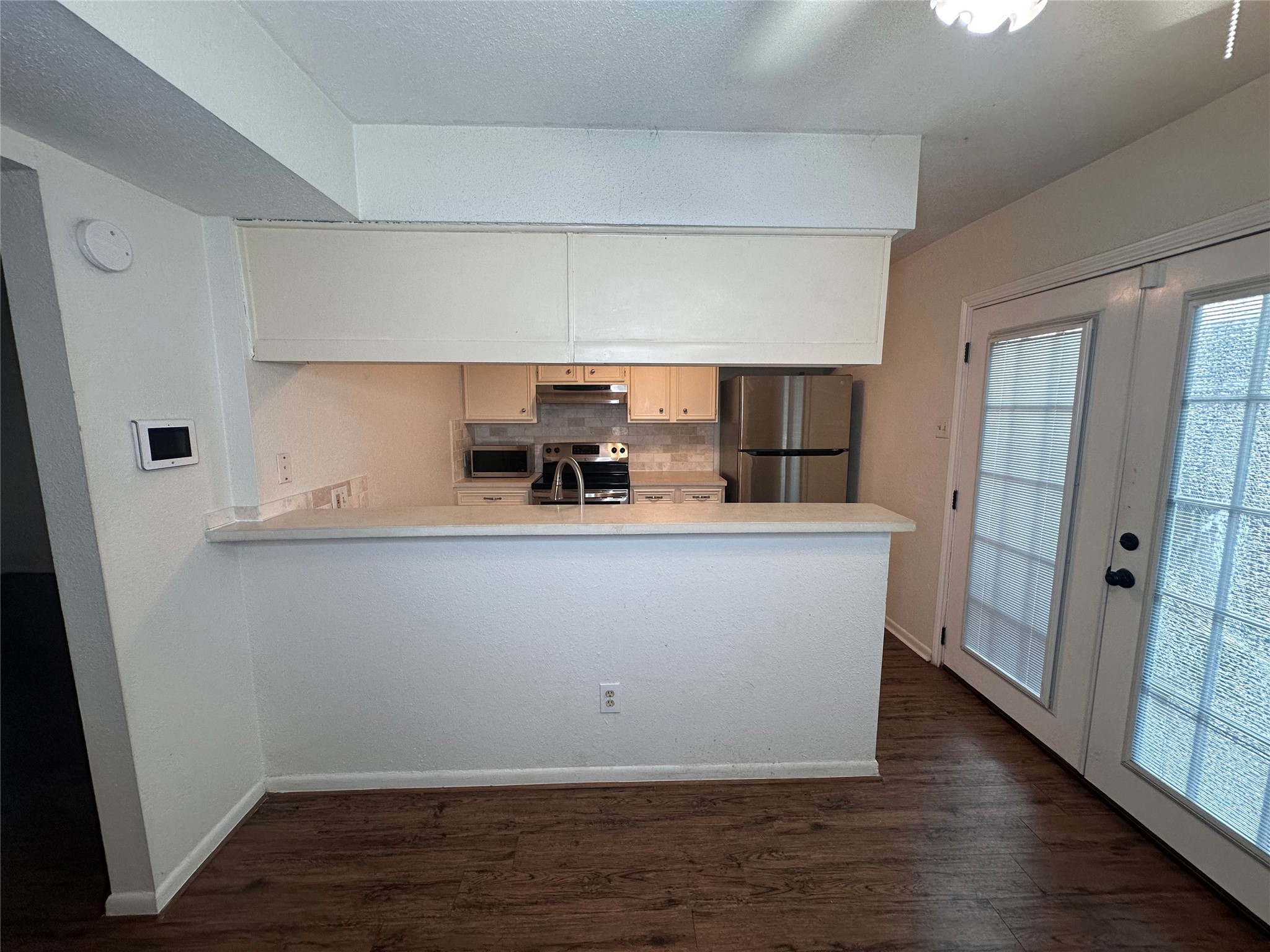 1413 Bonanza Road, Unit 413 Houston, TX 77062 - Photo 20 of 39 a room with wooden floor and utility