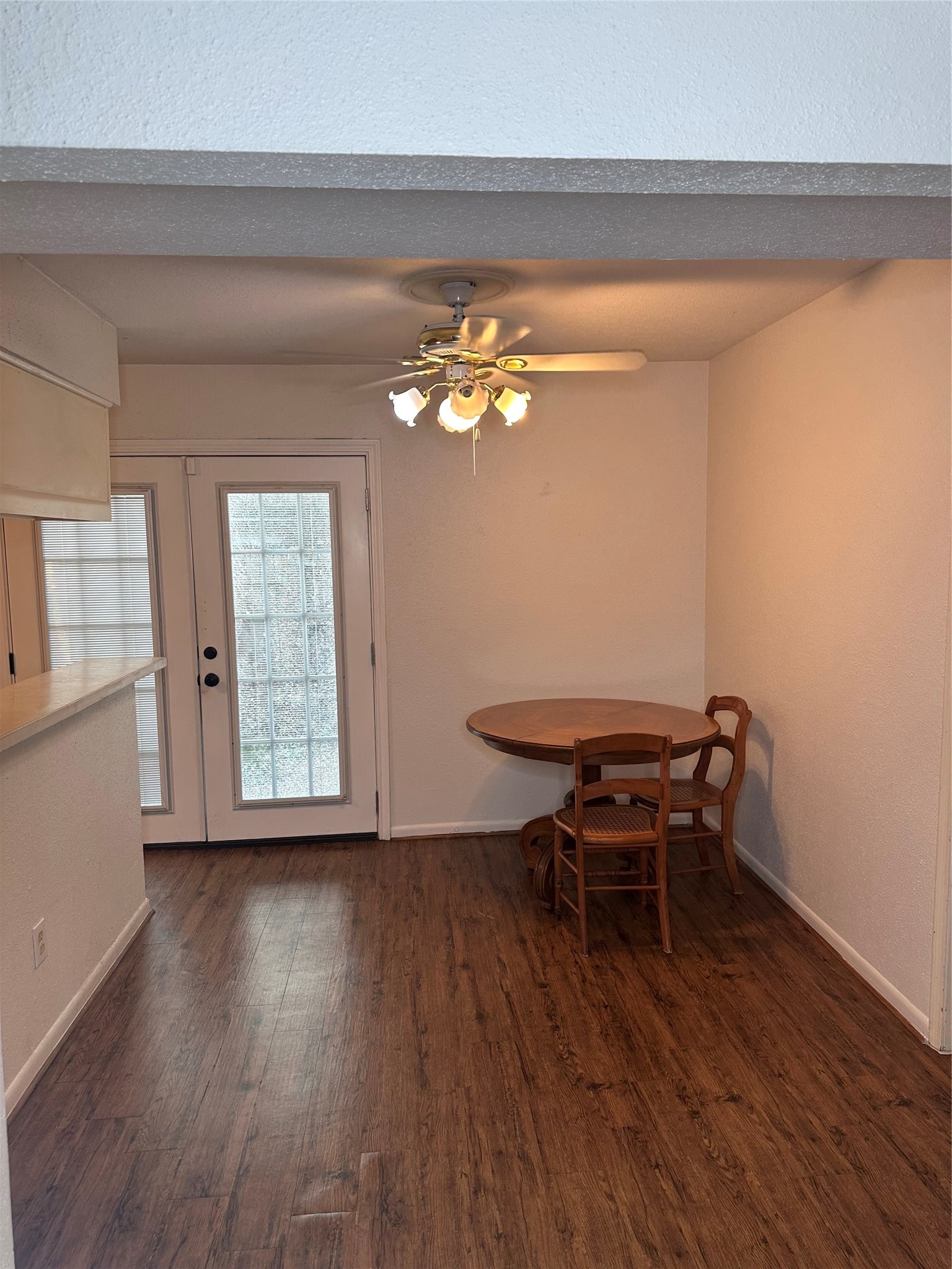 1413 Bonanza Road, Unit 413 Houston, TX 77062 - Photo 22 of 39 a view of workspace with wooden floor and a window