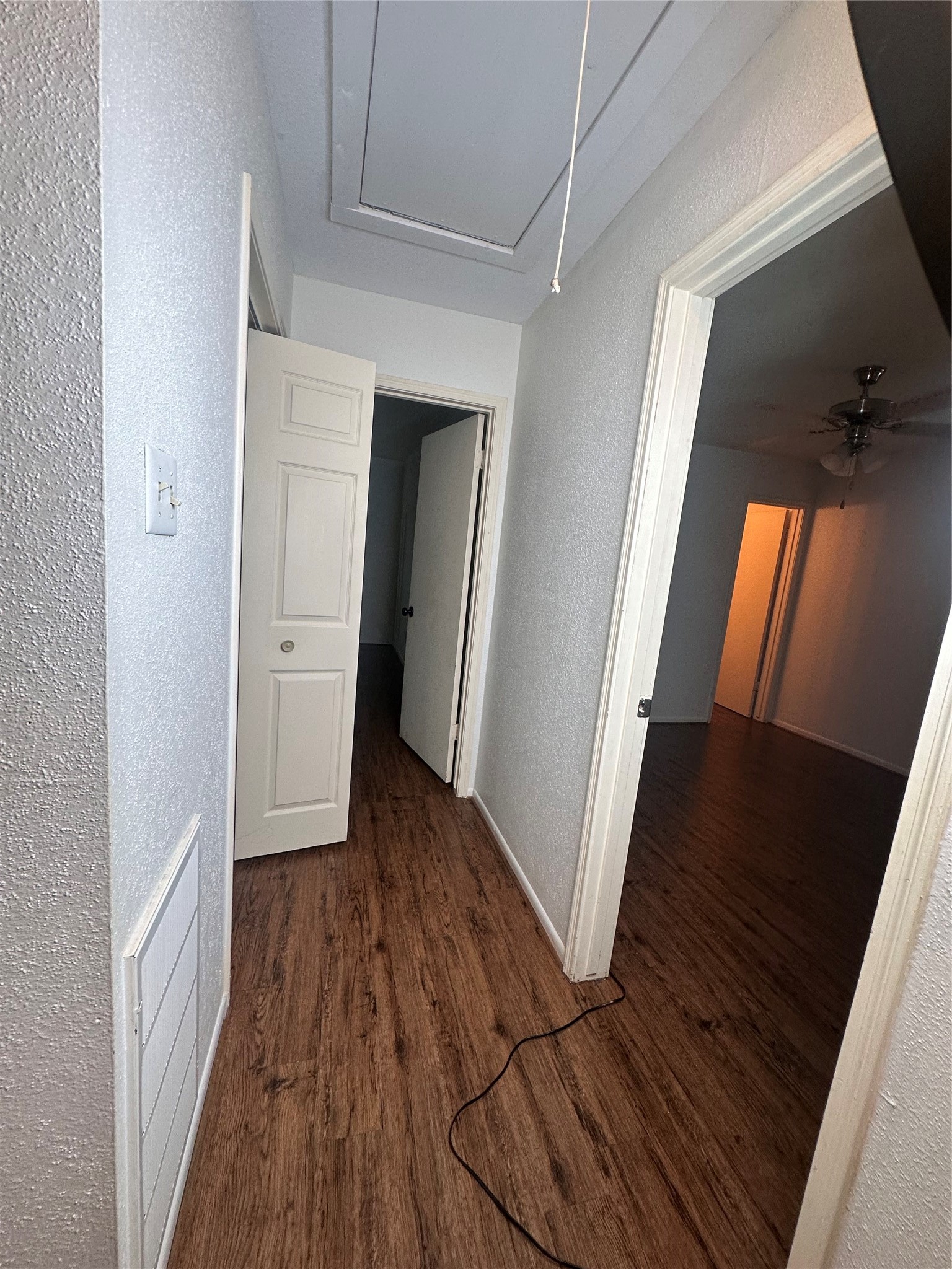 1413 Bonanza Road, Unit 413 Houston, TX 77062 - Photo 31 of 39 a view of a hallway with wooden floor and staircase