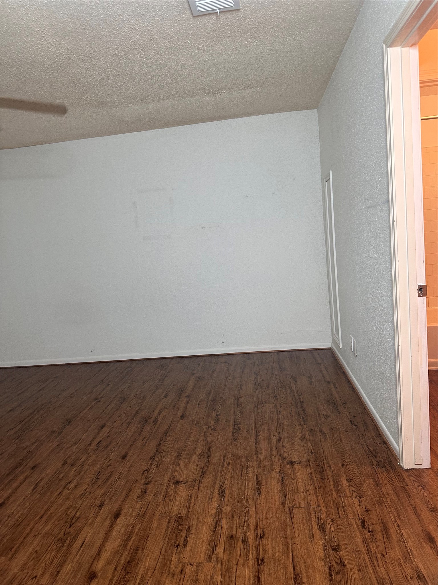 1413 Bonanza Road, Unit 413 Houston, TX 77062 - Photo 32 of 39 a view of an empty room and wooden floor
