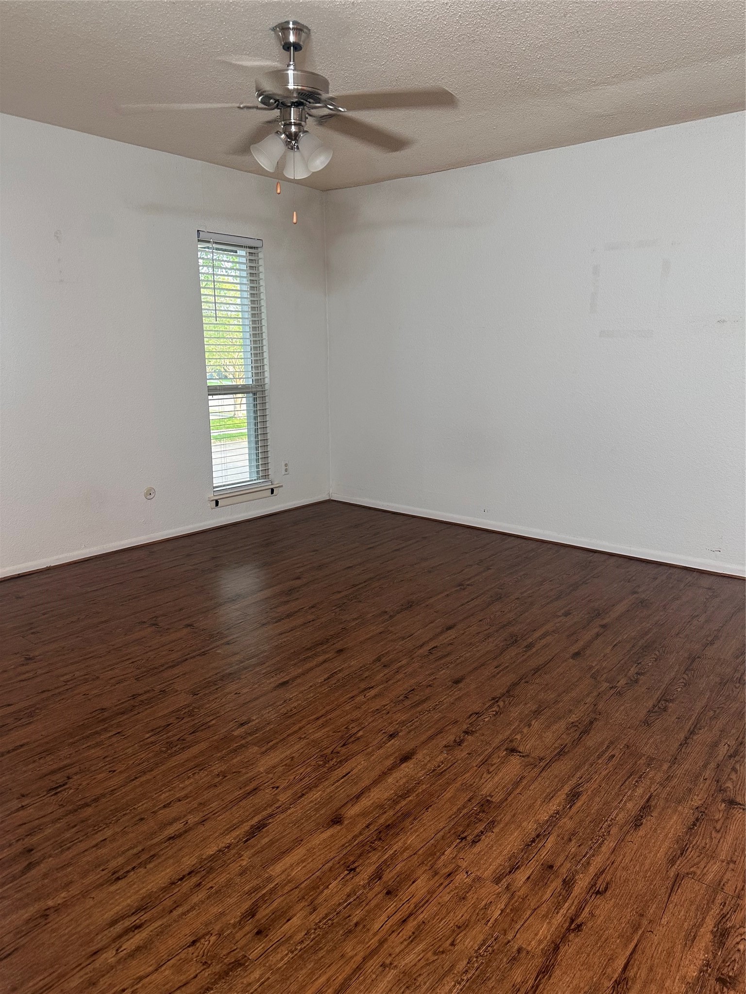 1413 Bonanza Road, Unit 413 Houston, TX 77062 - Photo 36 of 39 wooden floor in an empty room with a window