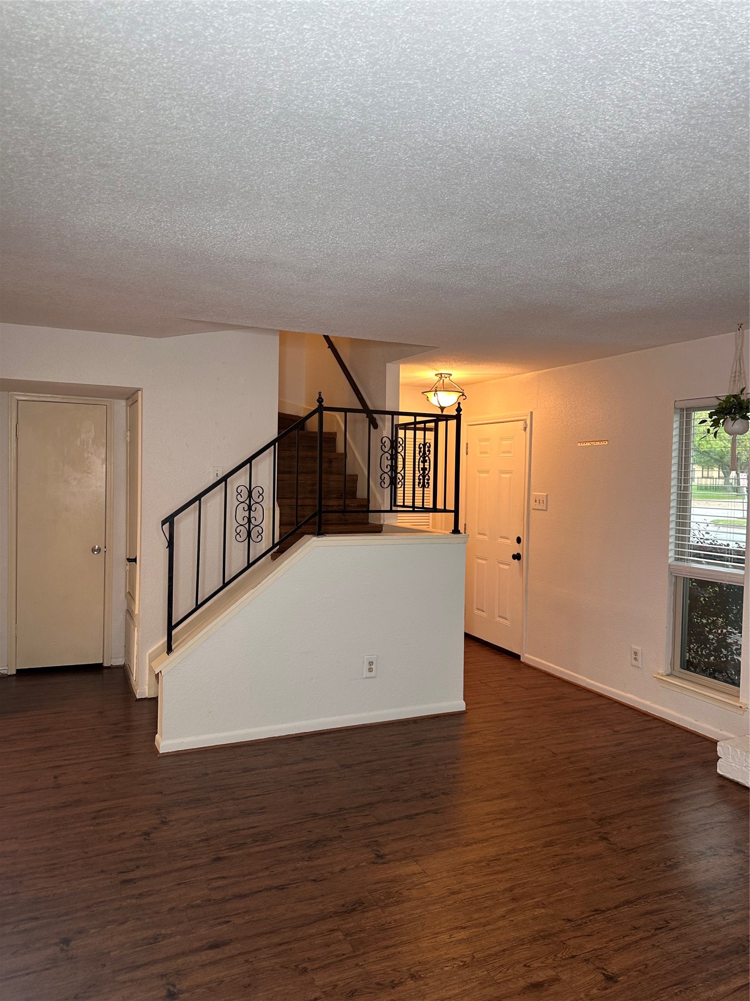 1413 Bonanza Road, Unit 413 Houston, TX 77062 - Photo 8 of 39 a view of entryway and hall with wooden floor