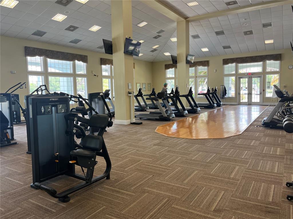 8744 Southwest 108th Ln Road Ocala, FL 34481 - Photo 25 of 28 a view of a room with gym equipment