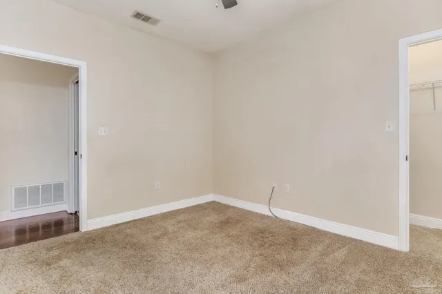 a view of a room with an empty space