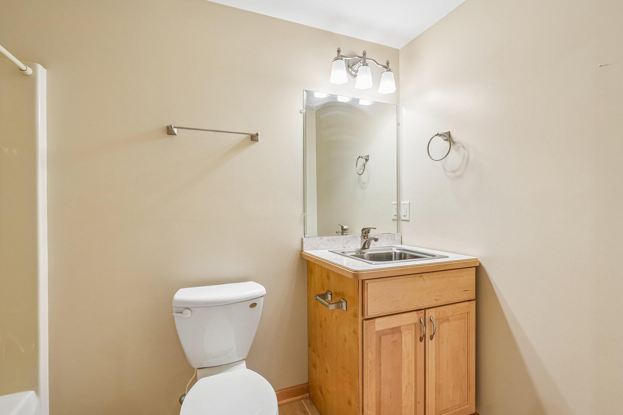 8040 West S County Line Road Franklin, WI 53132 - Photo 28 of 49 Full bathroom in the basement