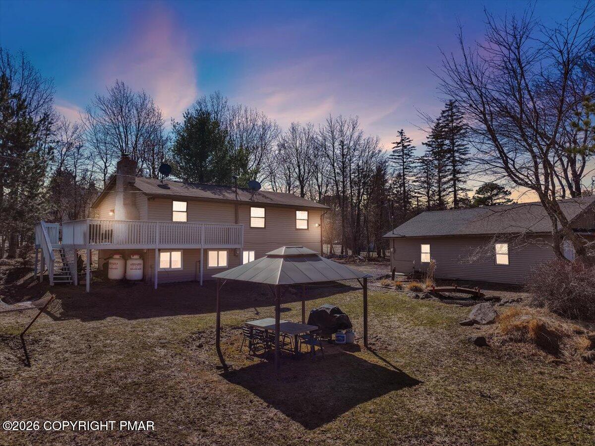 65 Highridge Road Albrightsville, PA 18210 - Photo 1 of 60 a view of a house with backyard and sitting area