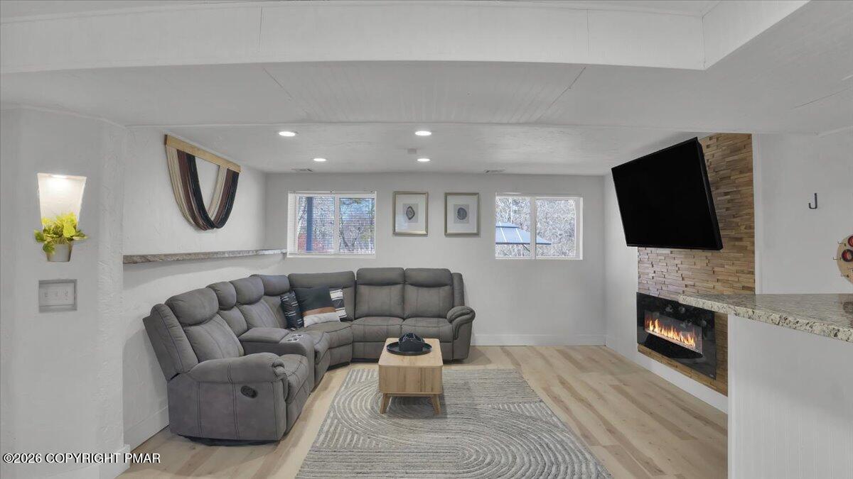 65 Highridge Road Albrightsville, PA 18210 - Photo 12 of 60 a living room with furniture fireplace and flat screen tv