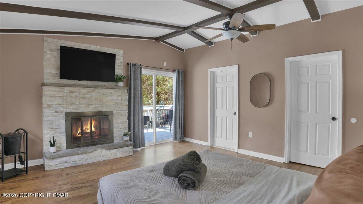 65 Highridge Road Albrightsville, PA 18210 - Photo 26 of 60 a living room with furniture and a fireplace