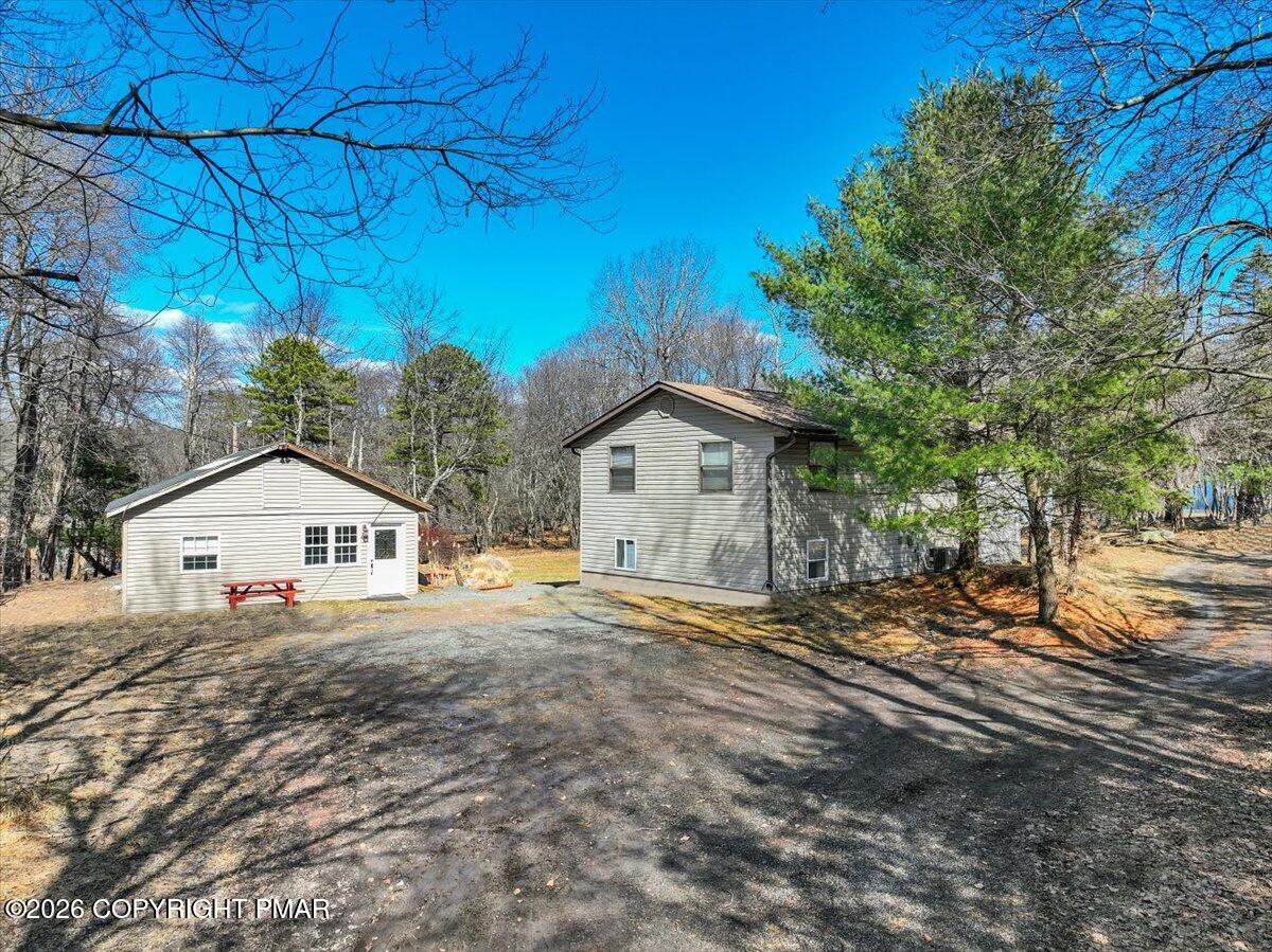 65 Highridge Road Albrightsville, PA 18210 - Photo 44 of 60 a house with trees in the background