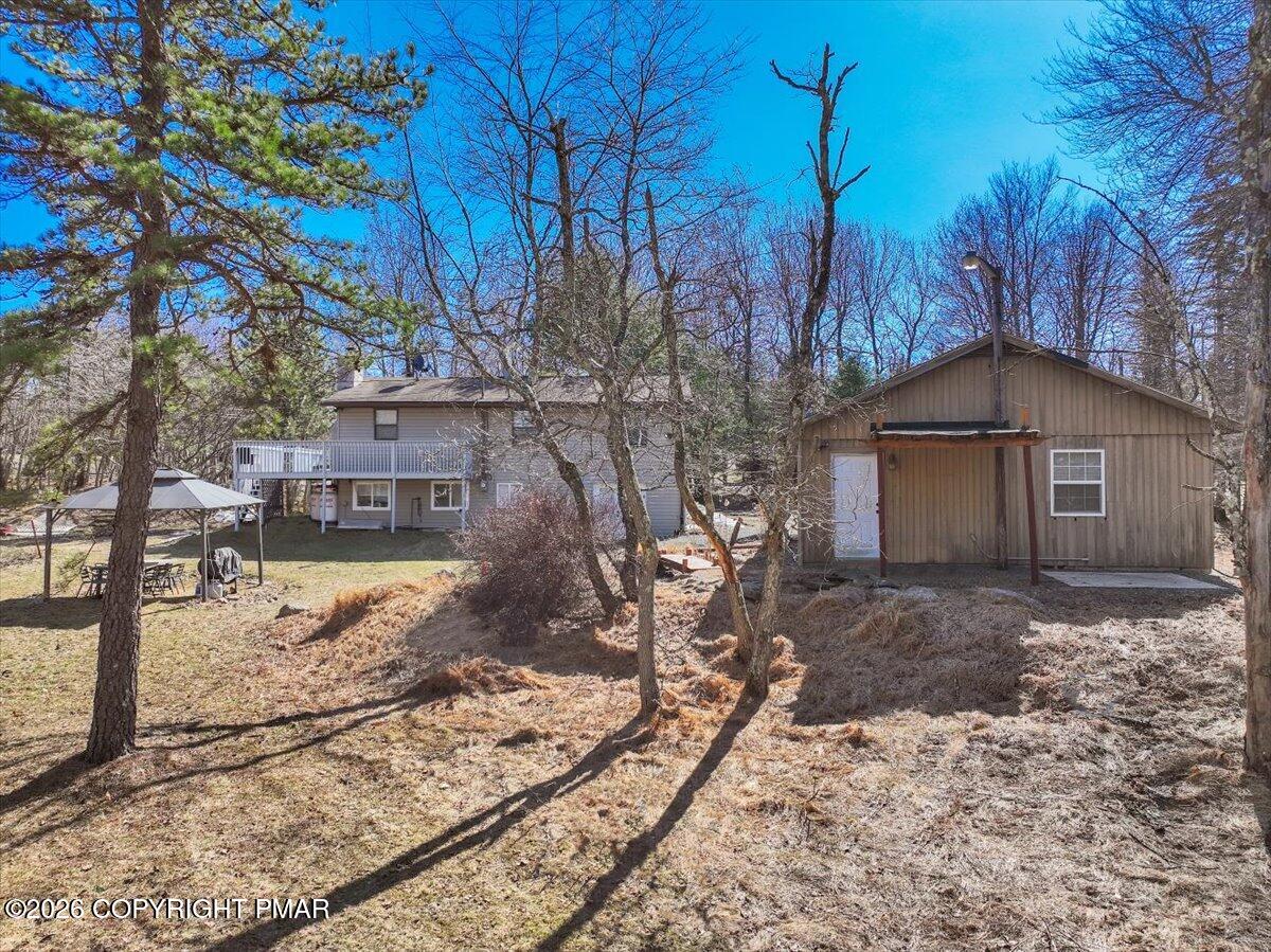 65 Highridge Road Albrightsville, PA 18210 - Photo 47 of 60 a front view of a house with a yard covered with snow