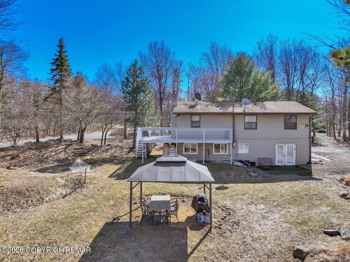 65 Highridge Road Albrightsville, PA 18210 - Photo 48 of 60 a view of a patio with furniture and a yard
