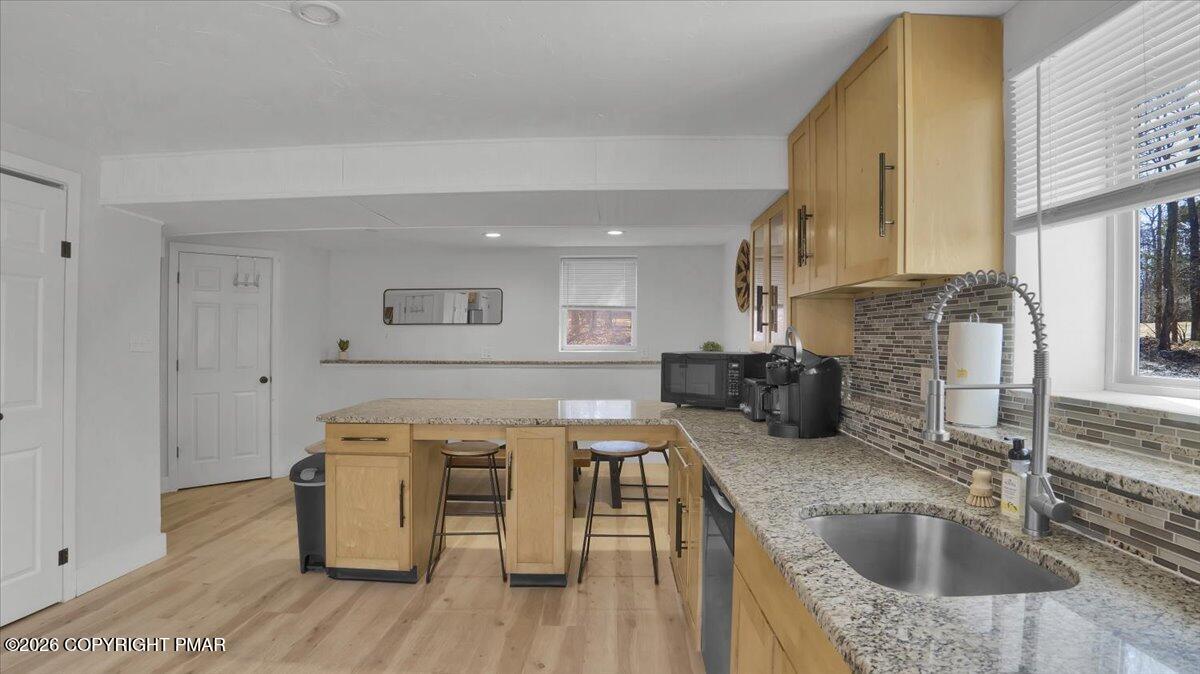 65 Highridge Road Albrightsville, PA 18210 - Photo 6 of 60 a kitchen with a sink a counter top space and stainless steel appliances