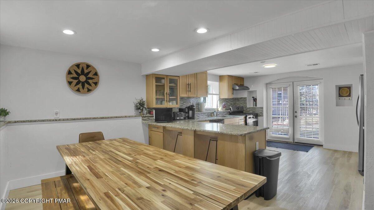 65 Highridge Road Albrightsville, PA 18210 - Photo 7 of 60 a large kitchen with a table and chairs in it