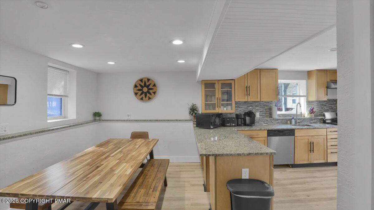 65 Highridge Road Albrightsville, PA 18210 - Photo 9 of 60 a large kitchen with kitchen island a sink stainless steel appliances and cabinets