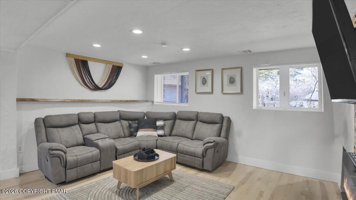 65 Highridge Road Albrightsville, PA 18210 - Photo 10 of 60 a living room with furniture and a couch