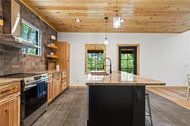 a dining room with a table and chairs
