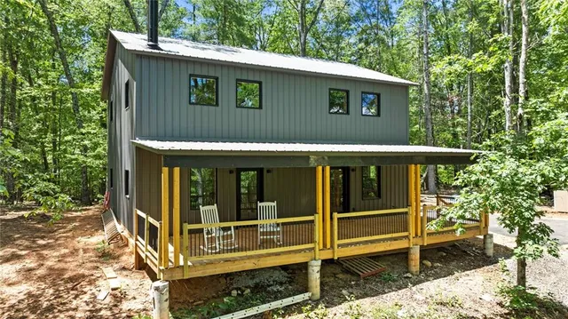 a view of house with outdoor space
