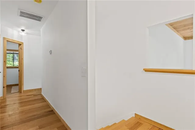 a room with window and a wooden floors