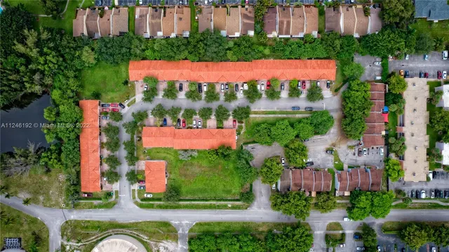 a view of swimming pool with a table and chairs