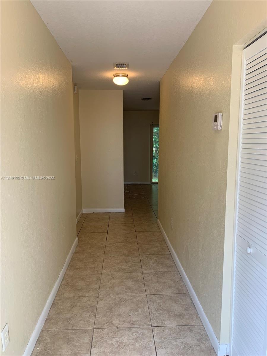 3837 Northwest 76th Way Davie, FL 33024 - Photo 12 of 34 a view of hallway with shower