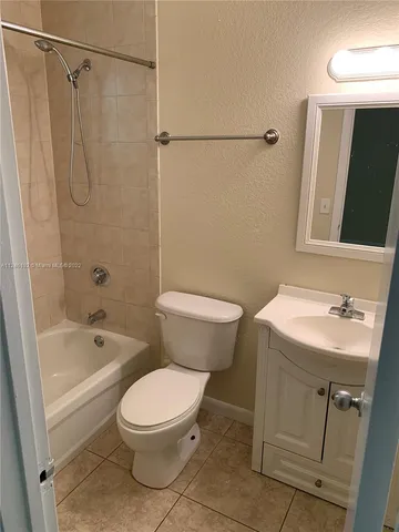 a view of hallway with a window